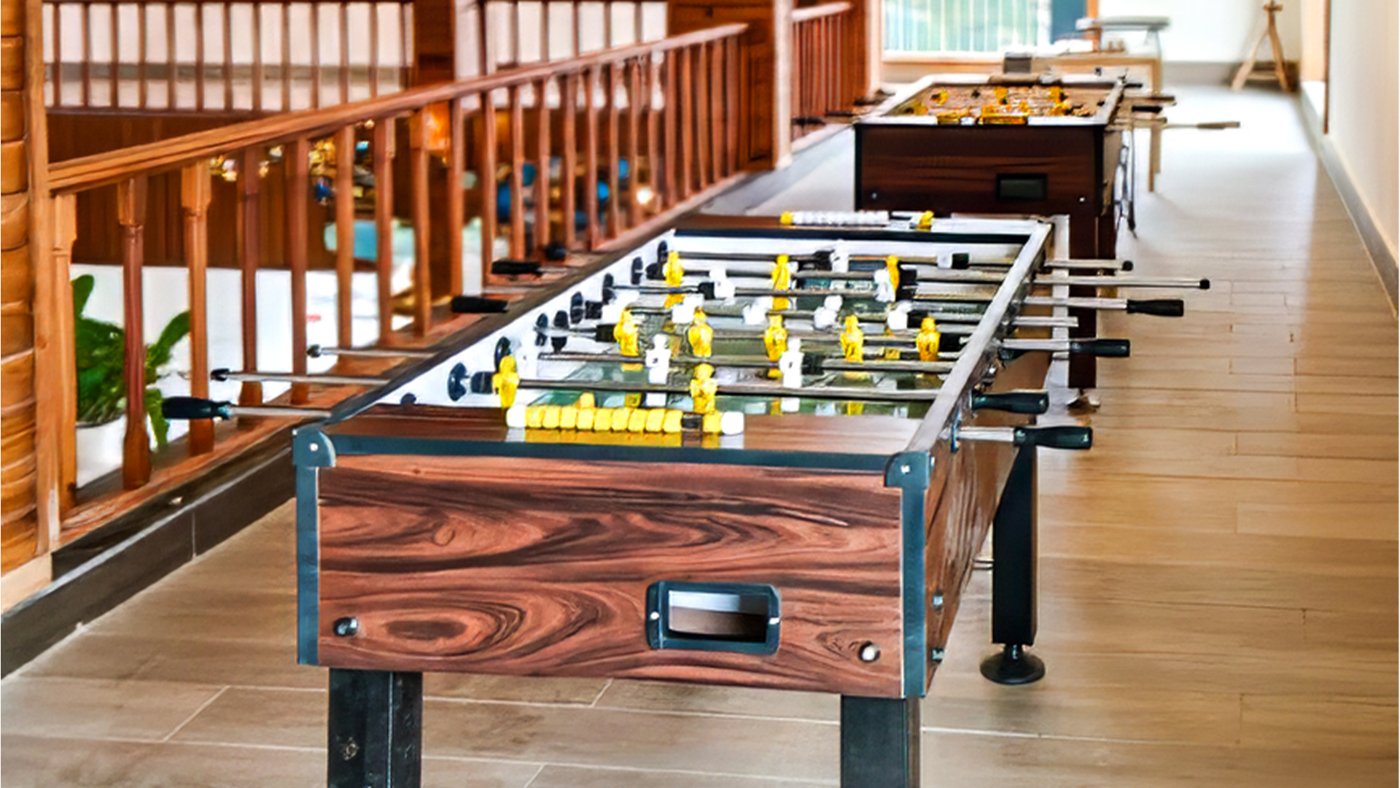 Foosball tables in the resort game zone