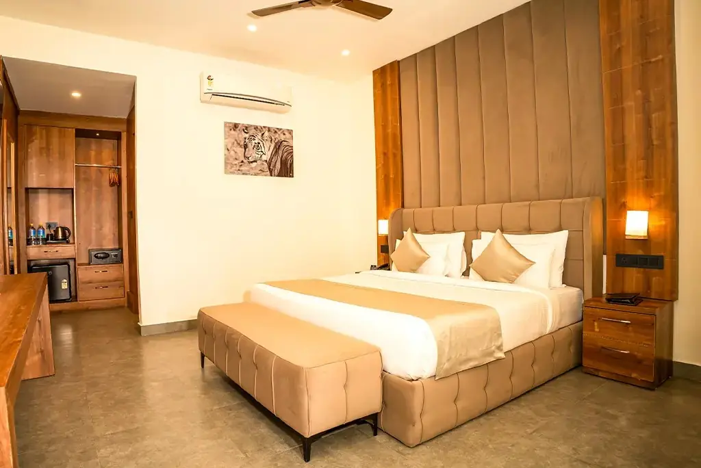 Deluxe Room with king bed and wood-panelled interior