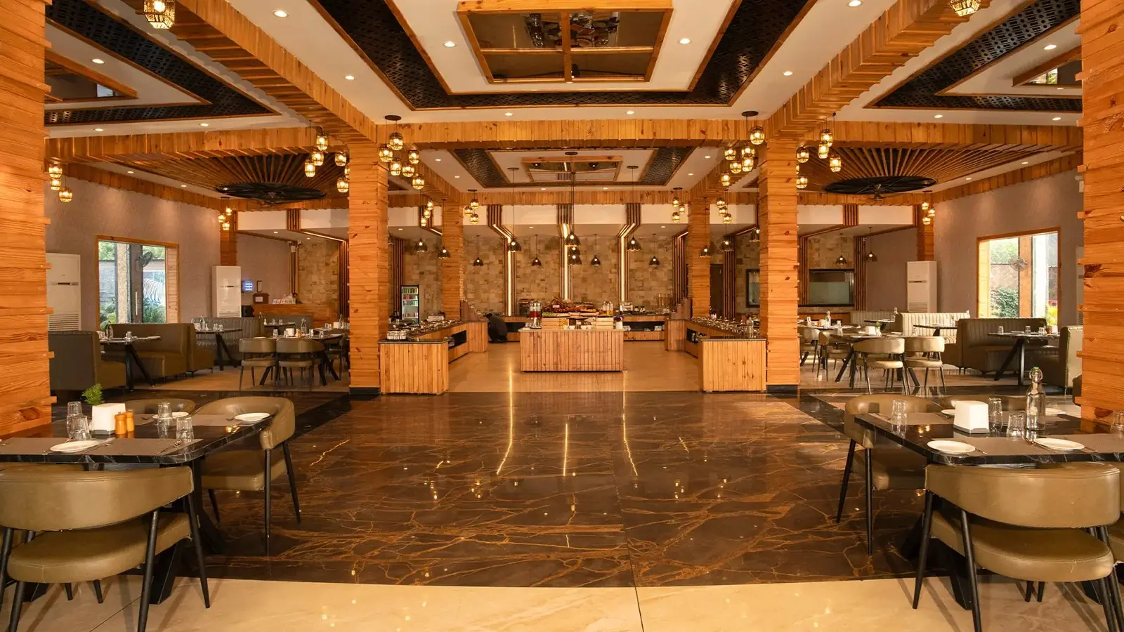 Wildwood dining space with elegant seating and warm lighting